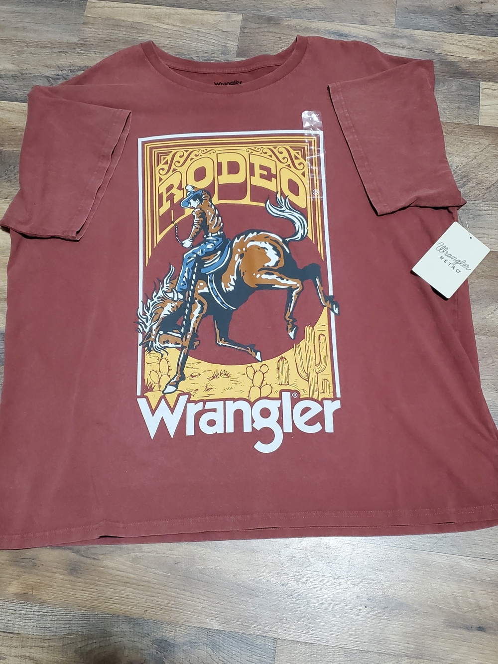 Wrangler Men’s Rodeo Graphic Tee — Rust Red with Yellow Print